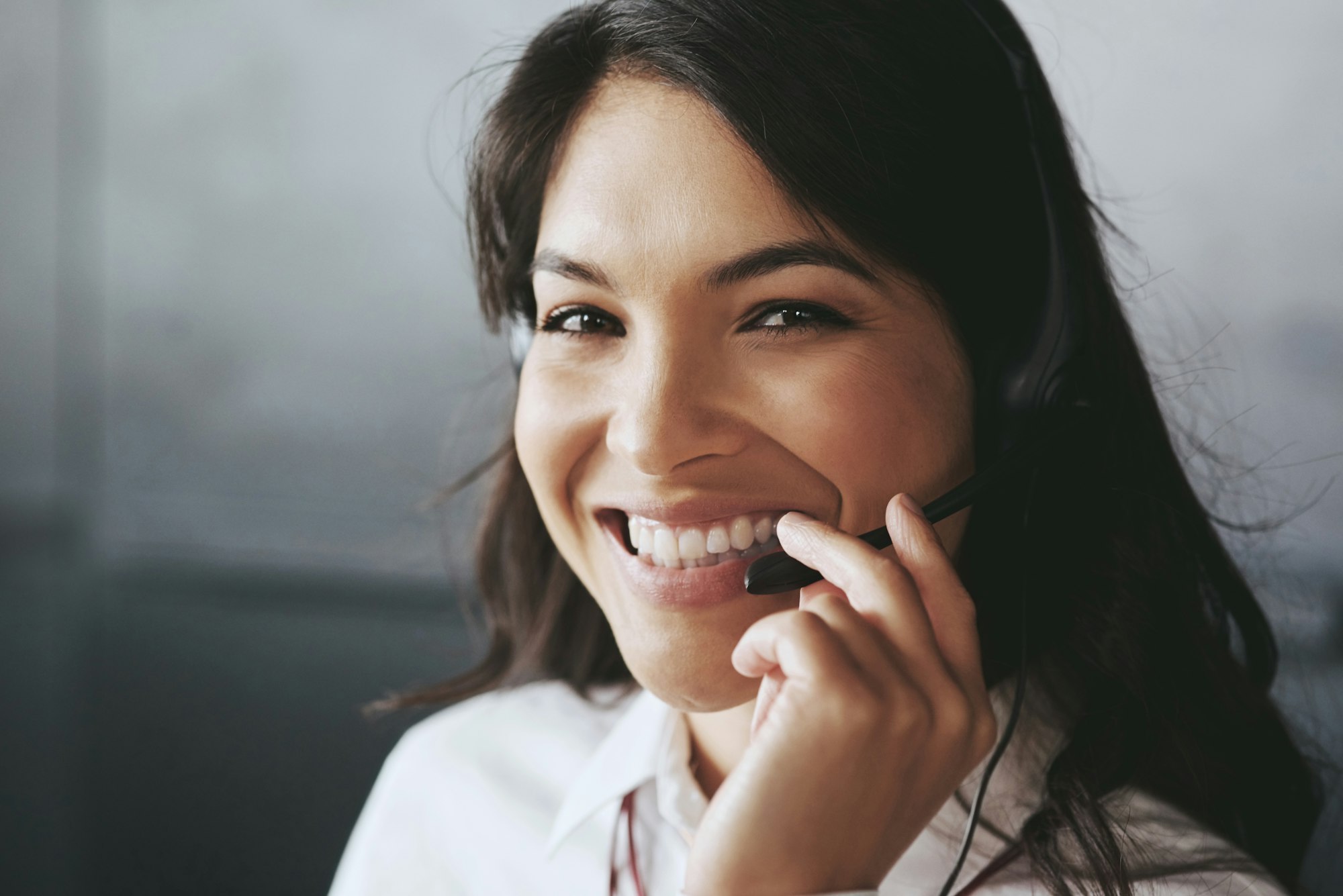 Shot of a friendly support agent working in an office